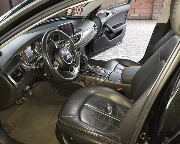 Чорний Ауді А6, об'ємом двигуна 2 л та пробігом 107 тис. км за 19998 $, фото 1 на Automoto.ua