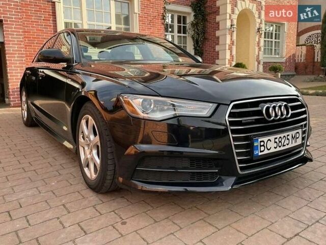 Черный Ауди А6, объемом двигателя 1.98 л и пробегом 64 тыс. км за 14500 $, фото 1 на Automoto.ua