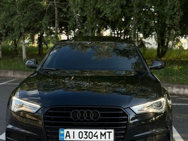 Черный Ауди А6, объемом двигателя 1.98 л и пробегом 76 тыс. км за 21000 $, фото 1 на Automoto.ua