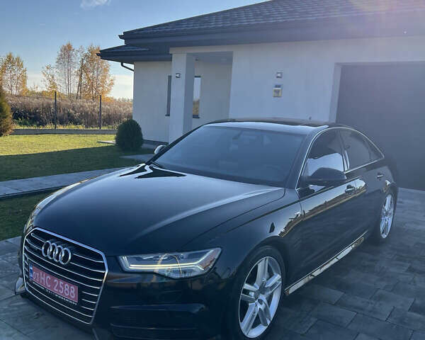 Черный Ауди А6, объемом двигателя 2 л и пробегом 162 тыс. км за 19200 $, фото 1 на Automoto.ua