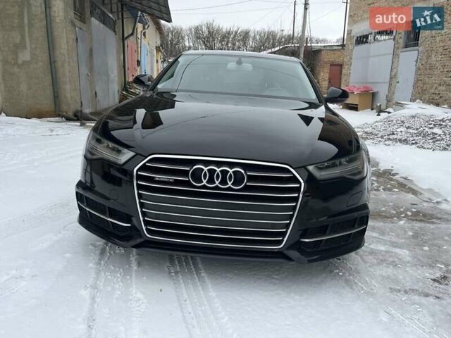 Чорний Ауді А6, об'ємом двигуна 2 л та пробігом 125 тис. км за 20700 $, фото 1 на Automoto.ua