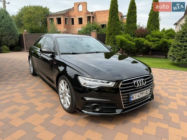 Чорний Ауді А6, об'ємом двигуна 3 л та пробігом 129 тис. км за 17950 $, фото 1 на Automoto.ua