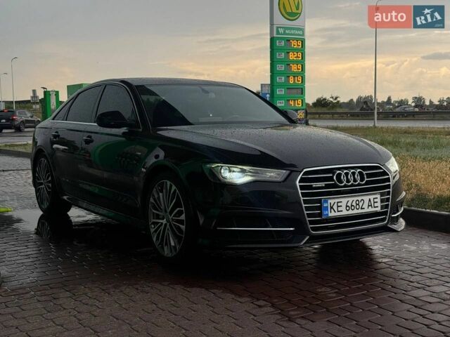 Черный Ауди А6, объемом двигателя 1.98 л и пробегом 65 тыс. км за 20900 $, фото 1 на Automoto.ua