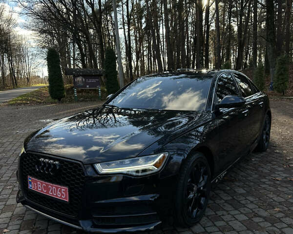 Чорний Ауді А6, об'ємом двигуна 1.98 л та пробігом 185 тис. км за 18499 $, фото 1 на Automoto.ua