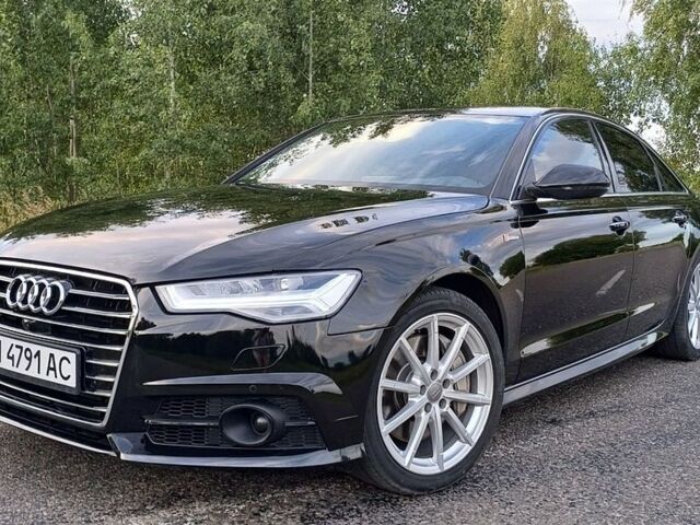 Черный Ауди А6, объемом двигателя 3 л и пробегом 128 тыс. км за 17900 $, фото 1 на Automoto.ua