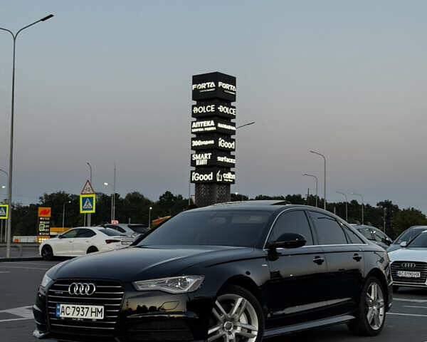Чорний Ауді А6, об'ємом двигуна 1.98 л та пробігом 205 тис. км за 15600 $, фото 1 на Automoto.ua