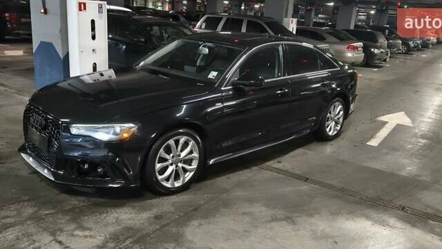 Черный Ауди А6, объемом двигателя 1.98 л и пробегом 145 тыс. км за 17500 $, фото 1 на Automoto.ua