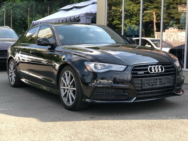 Черный Ауди А6, объемом двигателя 2 л и пробегом 17 тыс. км за 36000 $, фото 1 на Automoto.ua