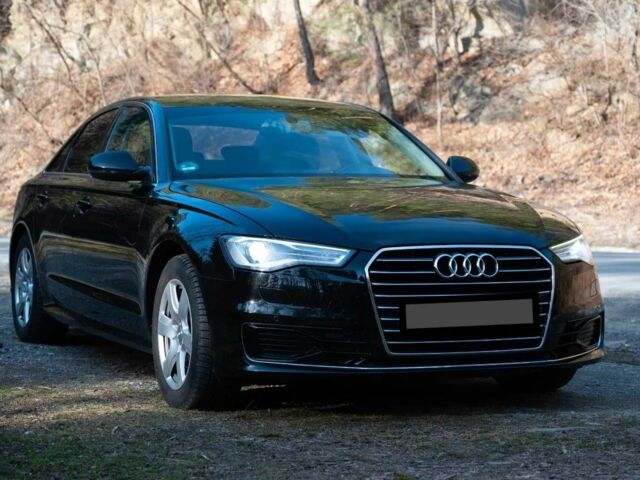 Чорний Ауді А6, об'ємом двигуна 2 л та пробігом 88 тис. км за 14400 $, фото 1 на Automoto.ua