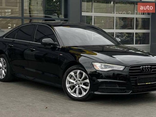 Чорний Ауді А6, об'ємом двигуна 1.98 л та пробігом 142 тис. км за 18600 $, фото 1 на Automoto.ua
