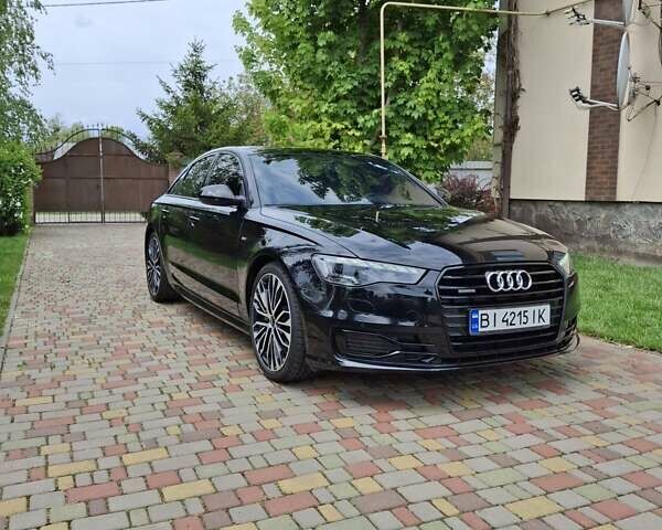Черный Ауди А6, объемом двигателя 1.98 л и пробегом 100 тыс. км за 23500 $, фото 1 на Automoto.ua