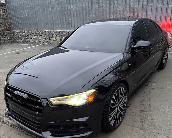 Черный Ауди А6, объемом двигателя 1.98 л и пробегом 64 тыс. км за 24900 $, фото 1 на Automoto.ua