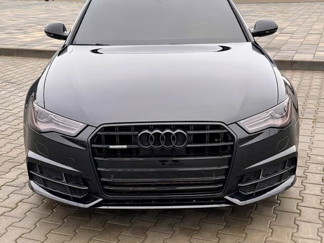 Черный Ауди А6, объемом двигателя 2 л и пробегом 64 тыс. км за 25000 $, фото 1 на Automoto.ua