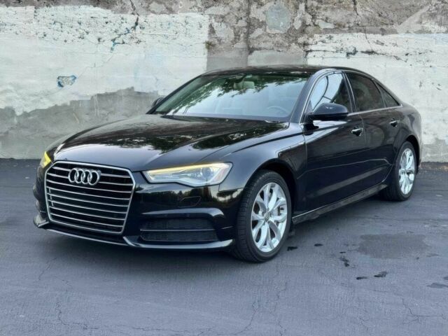 Чорний Ауді А6, об'ємом двигуна 2 л та пробігом 61 тис. км за 8000 $, фото 1 на Automoto.ua