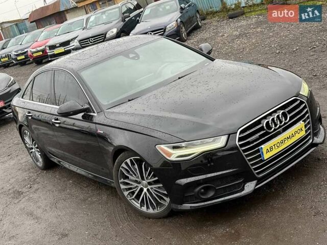 Чорний Ауді А6, об'ємом двигуна 3 л та пробігом 112 тис. км за 21890 $, фото 1 на Automoto.ua