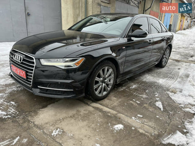 Черный Ауди А6, объемом двигателя 2 л и пробегом 127 тыс. км за 18950 $, фото 1 на Automoto.ua