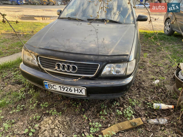 Черный Ауди А6, объемом двигателя 2.6 л и пробегом 419 тыс. км за 2500 $, фото 1 на Automoto.ua