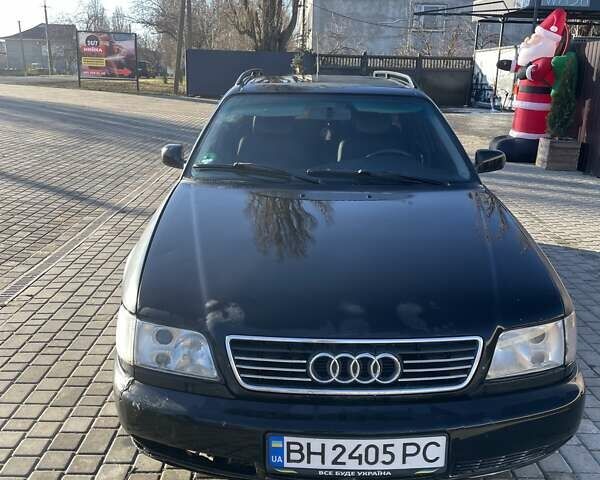 Черный Ауди А6, объемом двигателя 2.6 л и пробегом 663 тыс. км за 3500 $, фото 1 на Automoto.ua