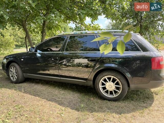 Черный Ауди А6, объемом двигателя 2.39 л и пробегом 312 тыс. км за 5700 $, фото 1 на Automoto.ua