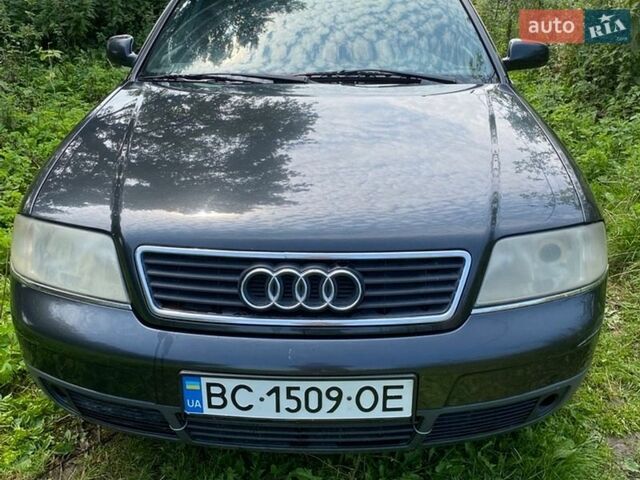 Черный Ауди А6, объемом двигателя 2.5 л и пробегом 290 тыс. км за 2999 $, фото 1 на Automoto.ua