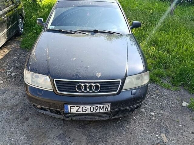 Черный Ауди А6, объемом двигателя 2.5 л и пробегом 300 тыс. км за 1650 $, фото 1 на Automoto.ua