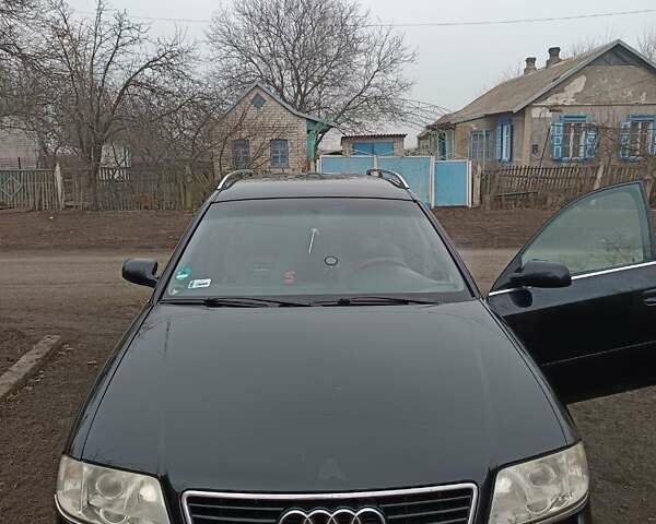 Черный Ауди А6, объемом двигателя 2.5 л и пробегом 370 тыс. км за 4000 $, фото 1 на Automoto.ua