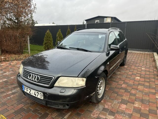 Черный Ауди А6, объемом двигателя 2.5 л и пробегом 300 тыс. км за 1500 $, фото 1 на Automoto.ua