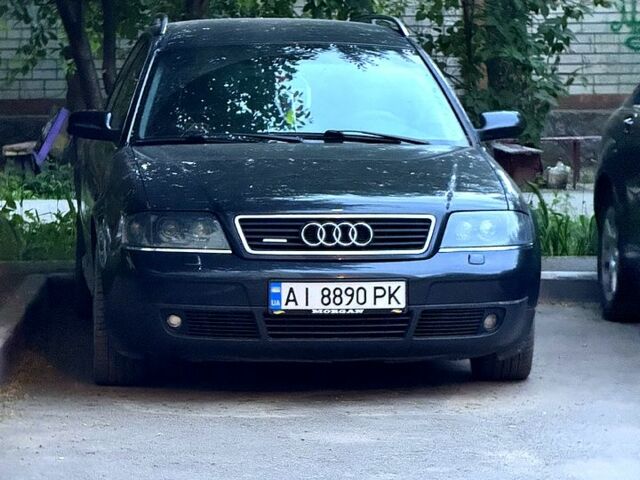 Черный Ауди А6, объемом двигателя 2.5 л и пробегом 303 тыс. км за 4000 $, фото 1 на Automoto.ua