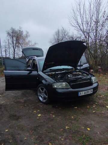 Черный Ауди А6, объемом двигателя 2.5 л и пробегом 320 тыс. км за 4100 $, фото 1 на Automoto.ua