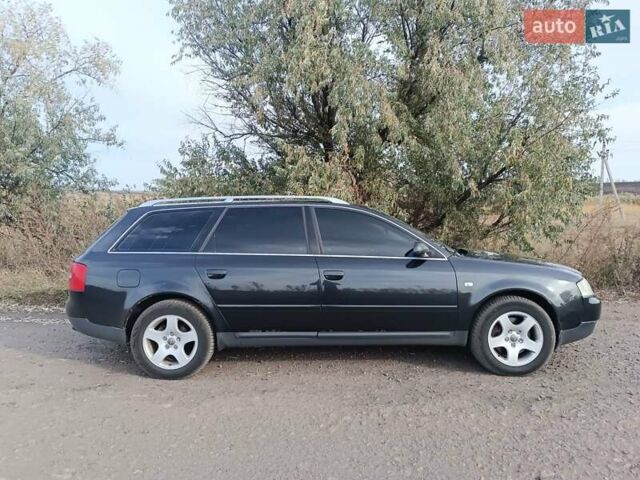 Черный Ауди А6, объемом двигателя 2.5 л и пробегом 310 тыс. км за 3400 $, фото 1 на Automoto.ua
