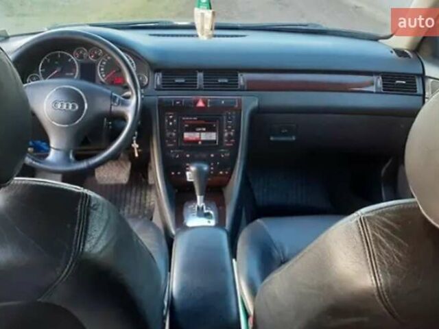 Черный Ауди А6, объемом двигателя 2.5 л и пробегом 382 тыс. км за 5250 $, фото 1 на Automoto.ua