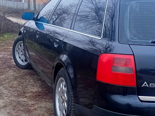 Черный Ауди А6, объемом двигателя 2.5 л и пробегом 343 тыс. км за 3900 $, фото 1 на Automoto.ua