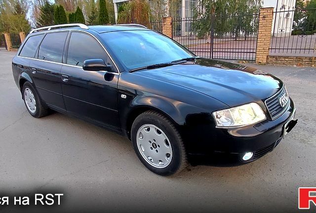 Черный Ауди А6, объемом двигателя 2.5 л и пробегом 400 тыс. км за 5350 $, фото 1 на Automoto.ua