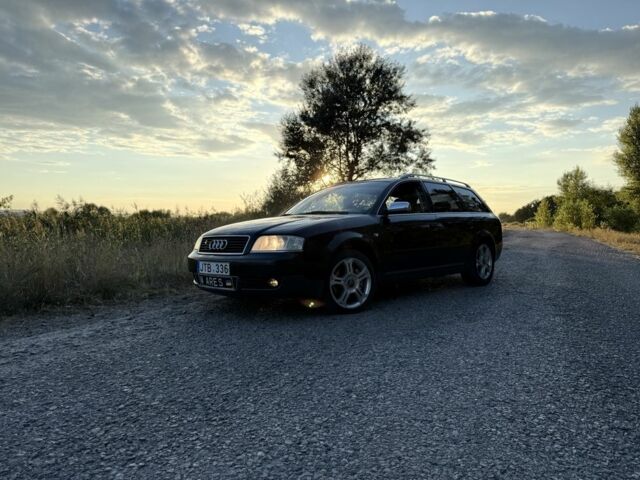 Черный Ауди А6, объемом двигателя 2.4 л и пробегом 200 тыс. км за 1548 $, фото 1 на Automoto.ua