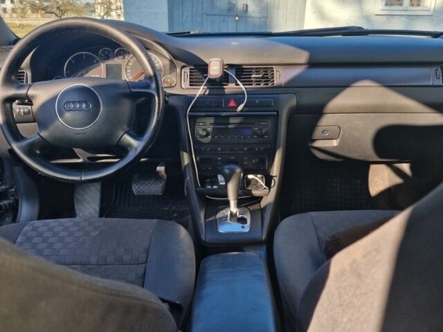 Черный Ауди А6, объемом двигателя 1.9 л и пробегом 315 тыс. км за 6398 $, фото 1 на Automoto.ua