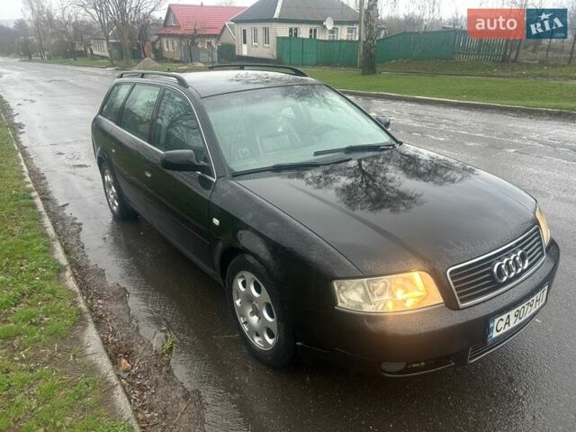 Черный Ауди А6, объемом двигателя 2.5 л и пробегом 282 тыс. км за 3300 $, фото 1 на Automoto.ua