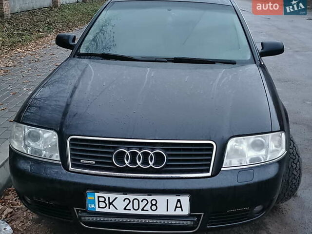 Чорний Ауді А6, об'ємом двигуна 2.39 л та пробігом 302 тис. км за 6000 $, фото 1 на Automoto.ua