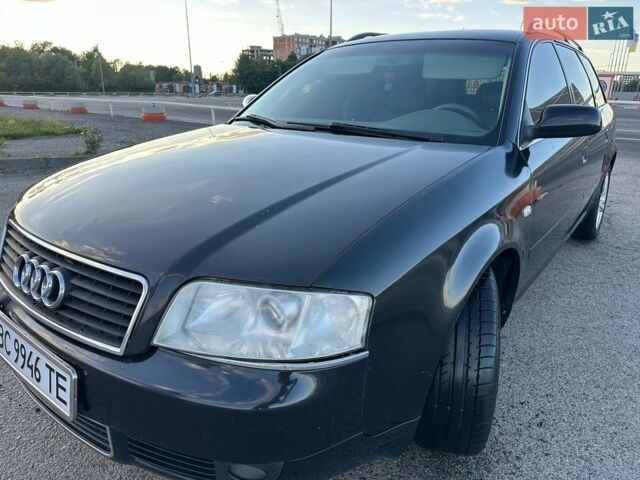 Черный Ауди А6, объемом двигателя 1.98 л и пробегом 265 тыс. км за 4900 $, фото 1 на Automoto.ua