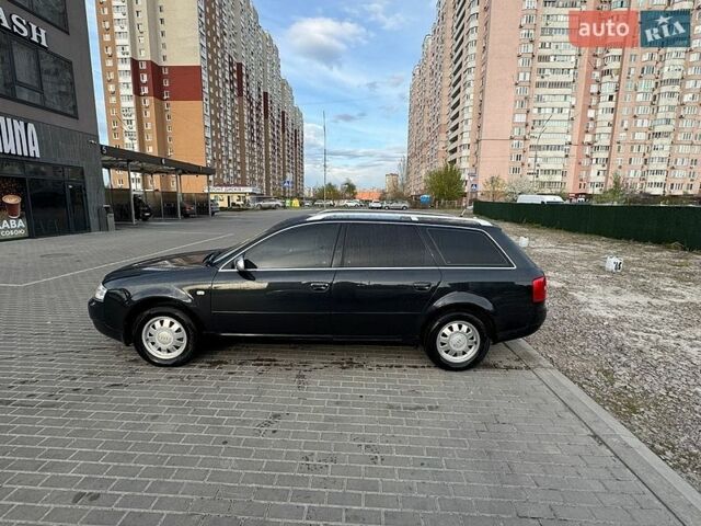 Черный Ауди А6, объемом двигателя 1.9 л и пробегом 243 тыс. км за 6500 $, фото 1 на Automoto.ua