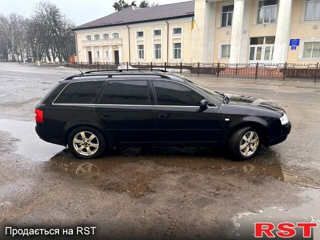 Черный Ауди А6, объемом двигателя 2.5 л и пробегом 321 тыс. км за 5200 $, фото 1 на Automoto.ua