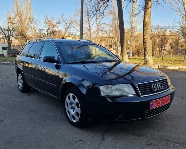 Черный Ауди А6, объемом двигателя 2 л и пробегом 285 тыс. км за 6000 $, фото 1 на Automoto.ua