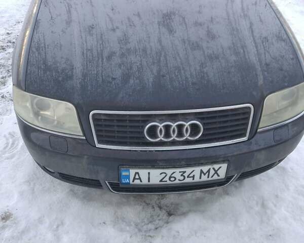 Черный Ауди А6, объемом двигателя 2.5 л и пробегом 302 тыс. км за 4000 $, фото 1 на Automoto.ua