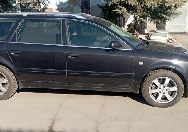 Черный Ауди А6, объемом двигателя 2.9 л и пробегом 302 тыс. км за 4300 $, фото 1 на Automoto.ua