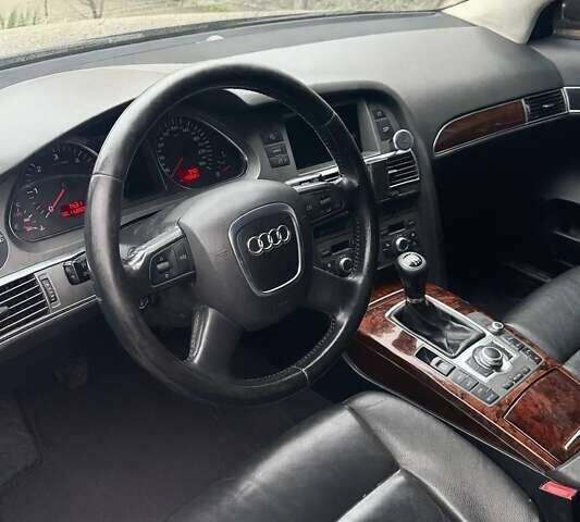 Чорний Ауді А6, об'ємом двигуна 1.97 л та пробігом 430 тис. км за 6799 $, фото 1 на Automoto.ua