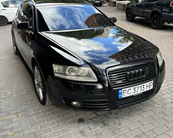 Черный Ауди А6, объемом двигателя 2 л и пробегом 285 тыс. км за 7250 $, фото 1 на Automoto.ua