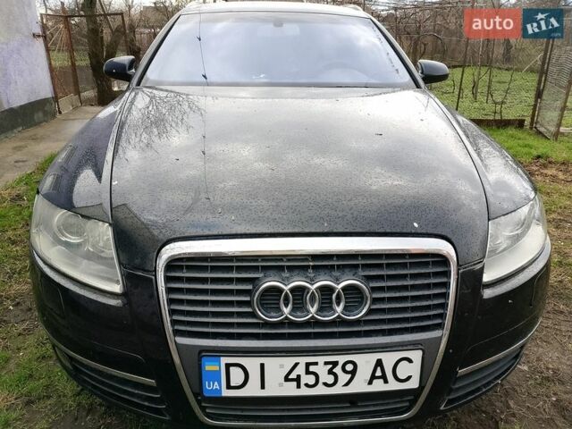 Черный Ауди А6, объемом двигателя 1.97 л и пробегом 299 тыс. км за 7200 $, фото 1 на Automoto.ua