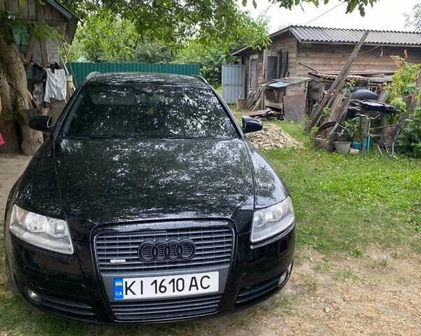 Черный Ауди А6, объемом двигателя 2 л и пробегом 300 тыс. км за 8400 $, фото 1 на Automoto.ua