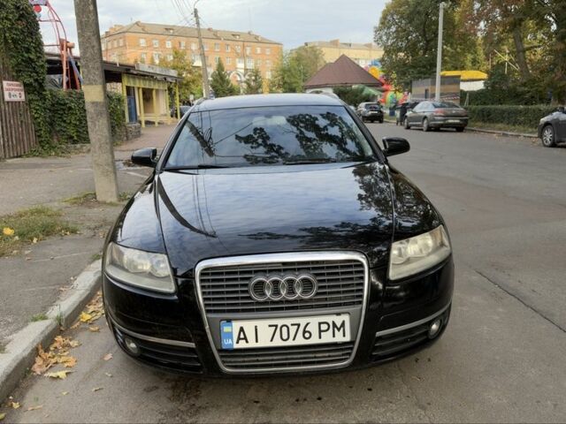 Черный Ауди А6, объемом двигателя 2 л и пробегом 290 тыс. км за 7528 $, фото 1 на Automoto.ua