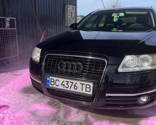 Черный Ауди А6, объемом двигателя 2 л и пробегом 305 тыс. км за 8298 $, фото 1 на Automoto.ua