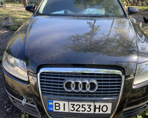 Черный Ауди А6, объемом двигателя 1.97 л и пробегом 300 тыс. км за 6000 $, фото 1 на Automoto.ua